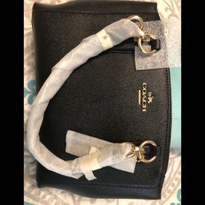 New Coach pocketbook with tags